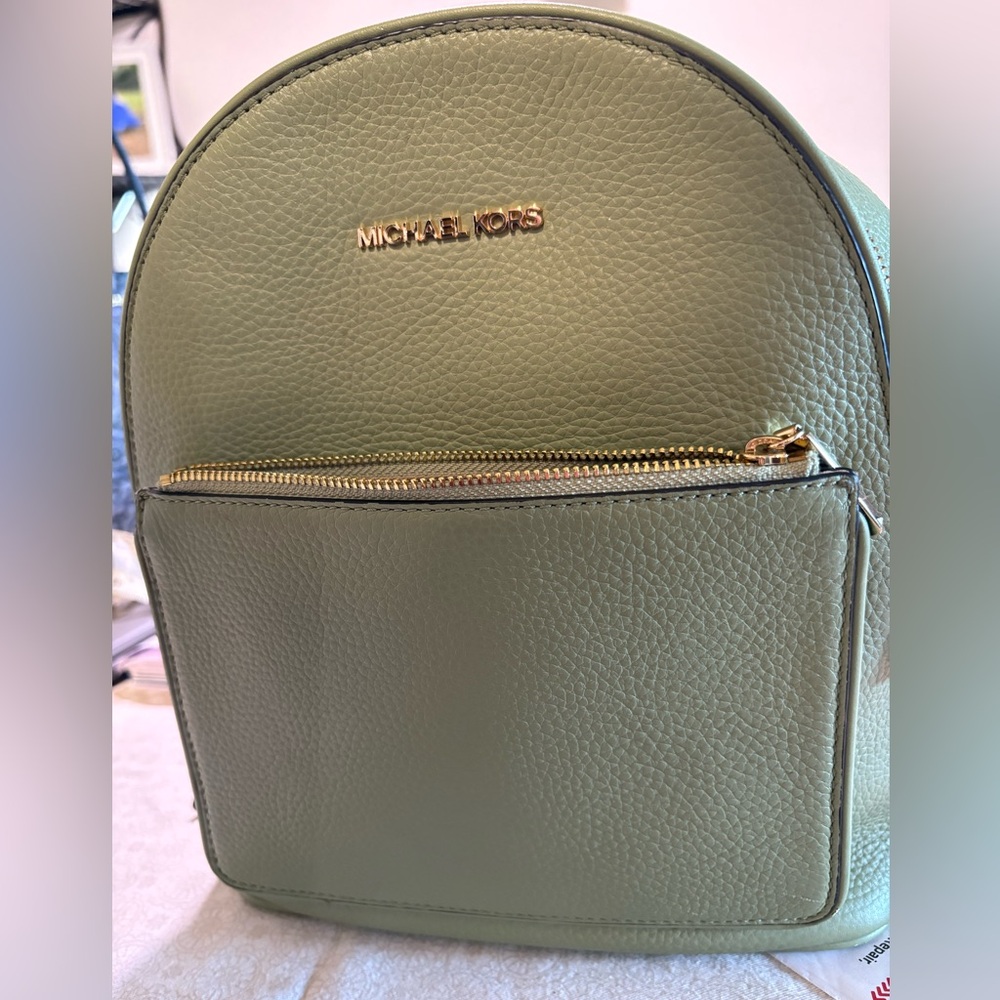 Michael Kohrs medium backpack purse